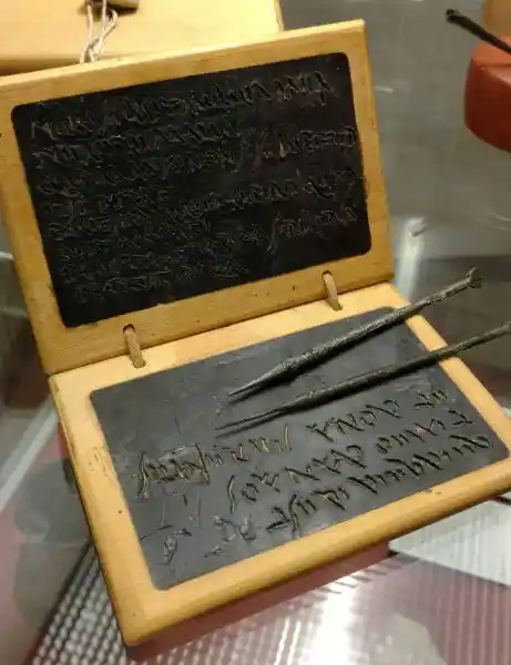 Wooden writing tablet and iron-bronze stylus